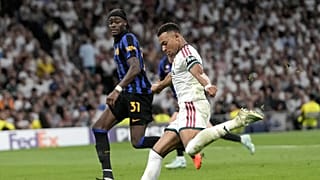 Real Madrid's Kylian Mbappe fights for the ball against Inter Milan's Yann Bisseck 