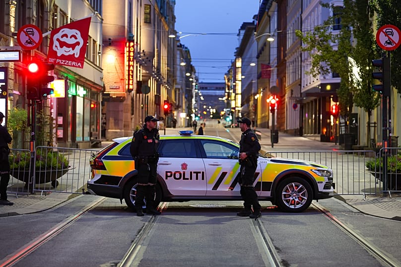 Police officers stand guard as large parts of Oslo are closed off ahead of King King Harald V's funeral, 8 September, 2026