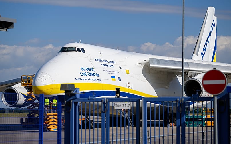 Ukrainian Antonov transport aircraft is parked behind a fence on the grounds of Leipzig/Halle Airport, 6 August, 2026