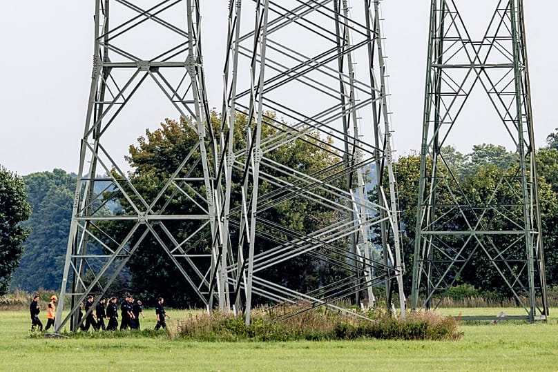 Police search the area around the extra-high-voltage power lines near the Turnow-Preilack substation and the Jänschwalde power plant in Preilack, 3 September, 2026