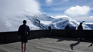 Tourists on the Mont-Blanc massif mountains from the Aiguille du Midi, in Chamonix, France, Saturday, Sept. 5, 2026. 