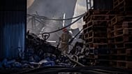 Firefighters work to extinguish a fire in a destroyed household chemical warehouse following a Russian missile and drone attack, in Kyiv, Ukraine, 8 September 2026.