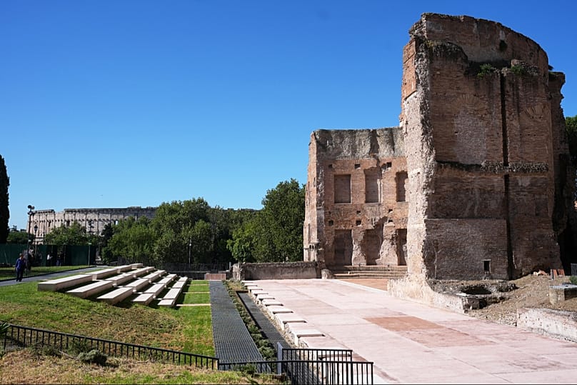 The Baths of Trajan in front of the Colosseum sits above the underground foundations where the restored "Painted City" fresco and Great Mosaic were found in the 1990s. 