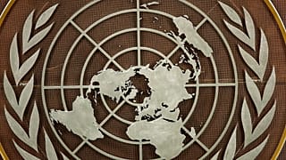 FILE: The United Nations logo is seen at the General Assembly hall at UN headquarters, 21 September 2021