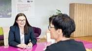 Moldova's Deputy PM Cristina Gherasimov, on the left, and European Commissioner for Enlargement Marta Kos, from the back, during the meeting in Brussels.