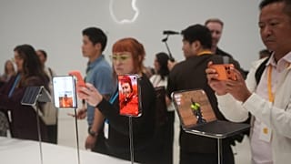 The iPhone Duo is displayed on Wednesday, Sept. 9, 2026, on the Apple campus in Cupertino, Calif. (AP Photo/Jeff Chiu)