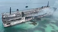 This image taken from video provided by the Philippine Coast Guard, shows smoldering remains of ferry that caught fire off wester Philippines on 10 September 2026.