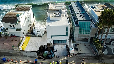 An aerial view of a sinkhole which collapsed the driveway of a coastal mansion owned by actor Nicolas Cage Tuesday, Sept. 8, 2026, in Malibu, Calif.