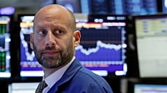 File - Specialist Meric Greenbaum works on the floor of the New York Stock Exchange, Wednesday, 14 June 2017.