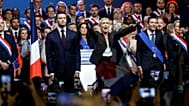 French far-right leader Marine Le Pen greets the crowd at the end of her political meeting in Henin-Beaumont, northern France, 13 September,