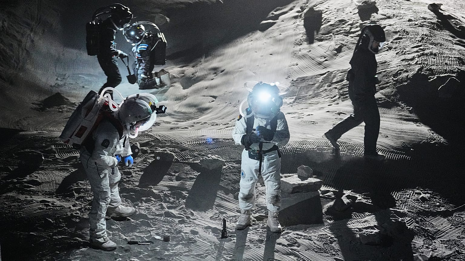 FILE - Scientists test newly developed spacesuits at the LUNA facility in preparation for missions to the moon at the German Aerospace Center near Cologne. Sept. 3, 2026