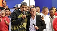 FILE - Venezuela's President Nicolas Maduro, left, and Alex Saab stand together during an event marking the anniversary of the 1958 coup that overthrew dictator Marcos Perez