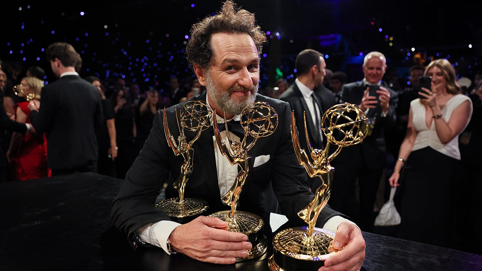 Three's company: Actor Matthew Rhys with record haul of Emmy's at the Television Academy's 78th Awards in Los Angeles 