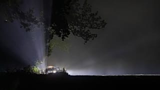 Lithuanian soldiers are securing the area where Italian fighter jets during NATO's Baltic Air Policing Mission
