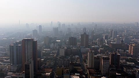 A dense haze of smoke hovers over Asuncion, Paraguay, Friday, Feb. 18, 2022, due to fires in the northern Argentina and southern Paraguay. 
