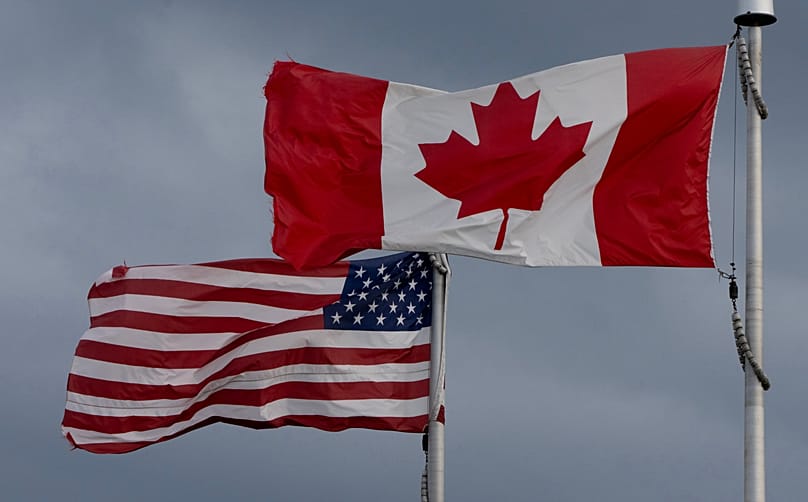 The flags of Canada and the United States fly over a stadium in Ottawa, Saturday, Sept. 12, 2026.