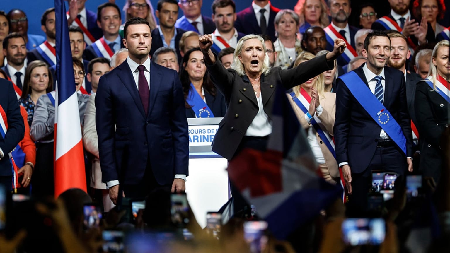 French far-right leader Marine Le Pen greets the crowd at the end of her political meeting, 13 September 2026 in Henin-Beaumont, northern France.