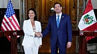 U.S. Secretary of State Marco Rubio, right, and Peruvian President Keiko Fujimori shake hands after a joint news conference at the presidential palace in Lima, Peru.