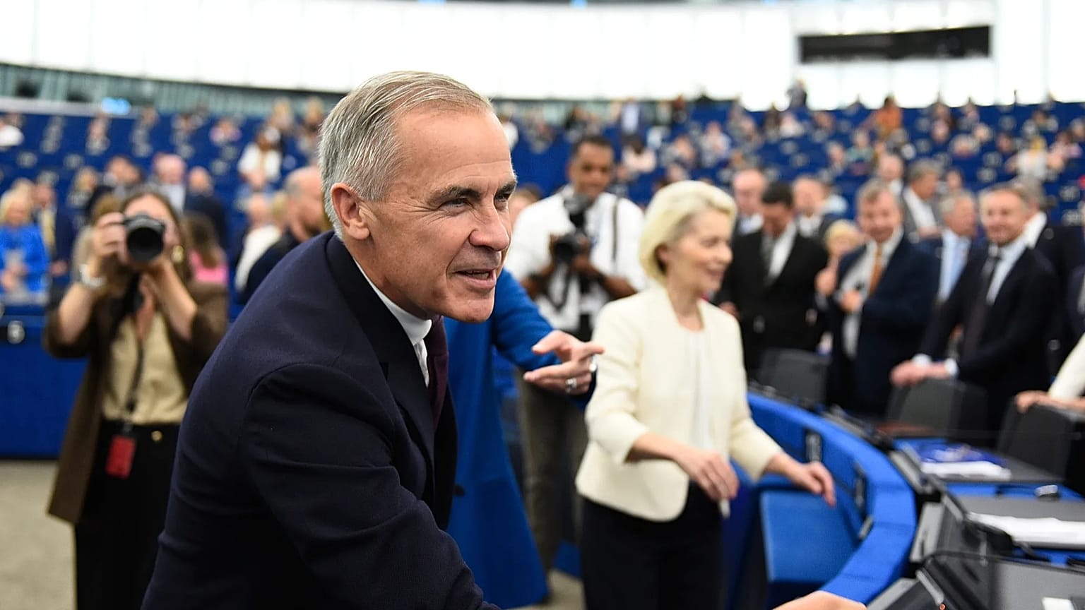 Canada's Prime Minister Mark Carney and European Commission President Ursula von der Leyen arrive for the 2026 State of the European Union in Strasbourg.
