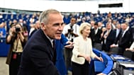 Canada's Prime Minister Mark Carney and European Commission President Ursula von der Leyen arrive for the 2026 State of the European Union in Strasbourg.