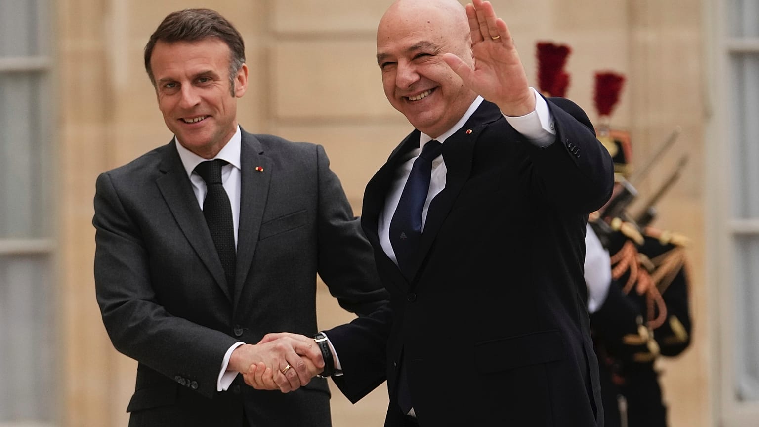 French President Emmanuel Macron, left, welcomes Lebanese president Joseph Aoun, at the Elysee Palace in Paris, 28 March 2025.