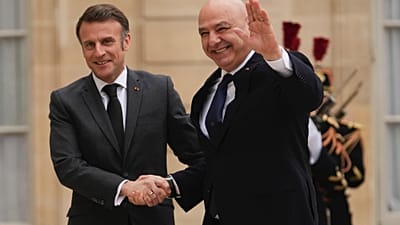 French President Emmanuel Macron, left, welcomes Lebanese president Joseph Aoun, at the Elysee Palace in Paris, 28 March 2025.