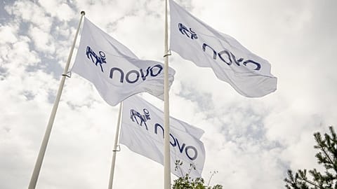 Flags bear the new logo for Novo at the company's headquarters in Bagsvaerd, Denmark, on Tuesday, Sept. 15, 2026.