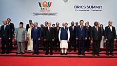 Participants of the BRICS Plus Outreach format pose for a photo in New Delhi, India, on Sunday, Sept. 13, 2026.