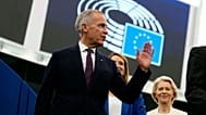 Canadian Prime Minister Mark Carney waves as he arrives in the Hemicycle of the European Parliament in Strasbourg, France.