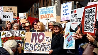 Campaigners and community members from across Scotland gather to protest outside the Scottish Parliament in Edinburgh, Scotland.
