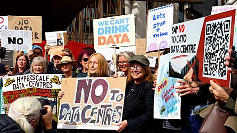 Campaigners and community members from across Scotland gather to protest outside the Scottish Parliament in Edinburgh, Scotland.