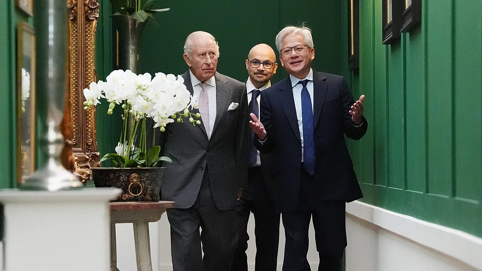 King Charles walks with Nvidia chief executive Jensen Huang and Sir Demis Hassabis. 17 September 2026