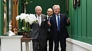 King Charles walks with Nvidia chief executive Jensen Huang and Sir Demis Hassabis. 17 September 2026
