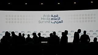 Visitors attend the opening day of the Arab Media Summit 2026 in Dubai, 15 September 2026