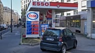 File - A car drives into a gas station as gasoline prices are displayed in Paris, Monday, 9 March 2026. 