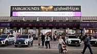زوار يمرون أمام سيارات الشرطة عند مدخل معرض دمشق الدولي الثالث والستين على مشارف دمشق، سوريا، الاثنين 31 أغسطس 2026.