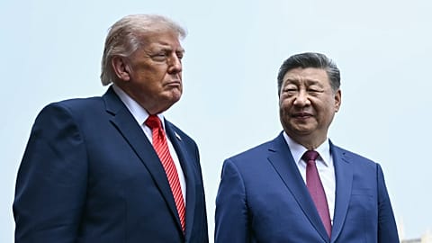 FILE: Chinese President Xi Jinping with his US counterpart during the latter's visit to the Temple of Heaven in Beijing