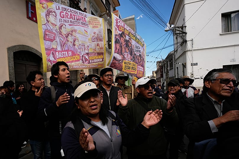 Teachers shout slogans during an anti-government protest in La Paz, Bolivia, Tuesday, Sept. 15, 2026