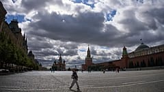 People walk in Red Square cloudy weather in Moscow, Wednesday, Aug. 19, 2026.