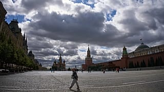 People walk in Red Square cloudy weather in Moscow, Wednesday, Aug. 19, 2026.