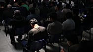 People deported from the US wait inside a processing centre in Guatemala City, 21 August, 2026