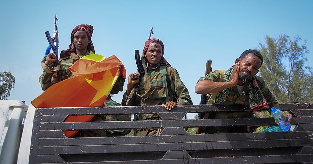 Tigray forces ride in a truck after taking control of Mekele
