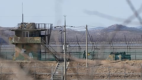 File photo. South Korean army soldiers patrol along the barbed-wire fence in Paju, South Korea, near the border with North Korea. 18 February 2025