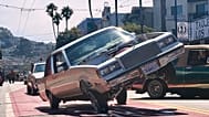 Drivers take part in the annual King of the Streets event celebrating lowriding, a Chicano car culture tradition, Saturday, Sept. 19, 2026, in San Francisco.