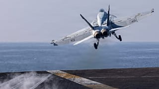 FILE: An F/A-18E Super Hornet launching from the flight deck of US Navy aircraft carrier USS Abraham Lincoln on Day 1 of Iran war, 28 February 2026