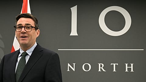 File photo. Britain's Prime Minister Andy Burnham stands in front of a 10 North sign. 18 September 2026