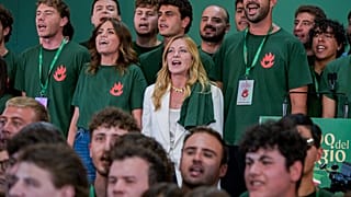 Meloni at a youth rally of her Fratelli d'Italia group 