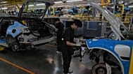 FILE. Workers assemble the Zeekr 001 EV models at the Chinese automaker Zeekr assembly plant in Ningbo, east China's Zhejiang Province, 17 April 2025