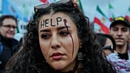 یکی از شرکت‌کنندگان در تجمع مونیخ ۲۰۲۶