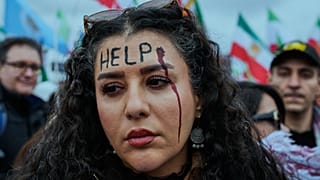 یکی از شرکت‌کنندگان در تجمع مونیخ ۲۰۲۶